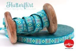 Show details for 3m roll webbing design by jolijou, 15mm wide, flutterflirt turquoise Picture of 3m roll webbing design by jolijou, 15mm wide, flutterflirt turquoise