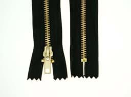 Show details for 18cm zipper - 5mm metal rail - color: black/gold - 10 pieces Picture of 18cm zipper - 5mm metal rail - color: black/gold - 10 pieces